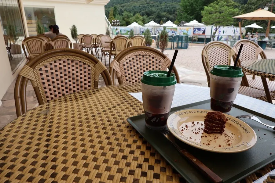 Cake and drink on an outdoor table