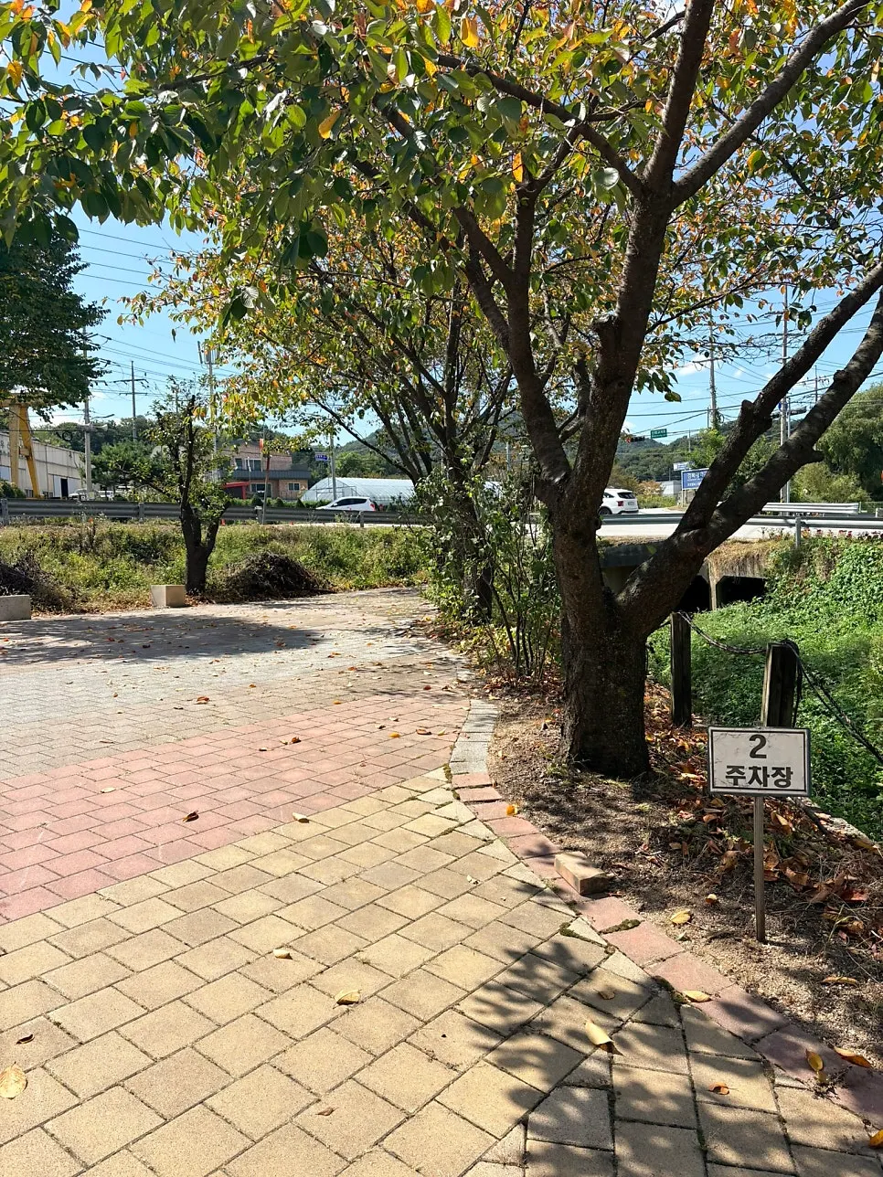 Signage and parking space for Myeongimong's second lot