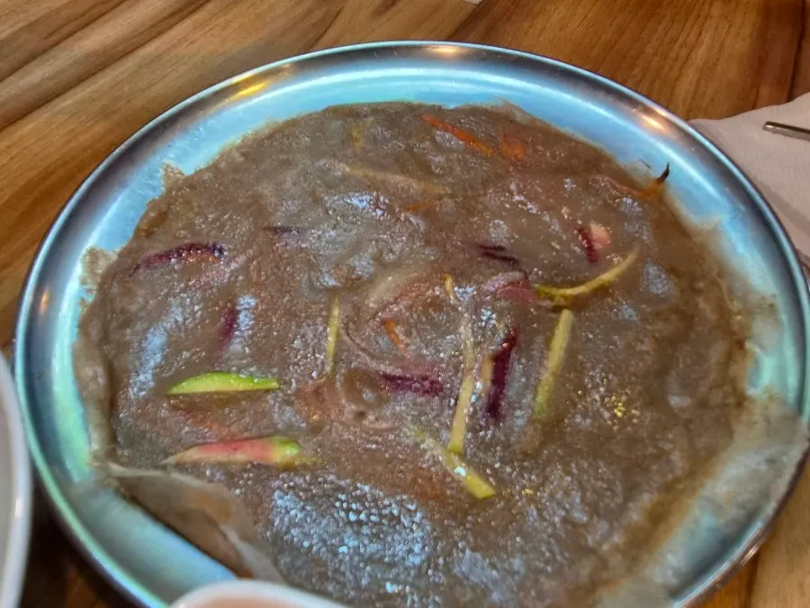 Mul makguksu broth with the seasoning sauce added