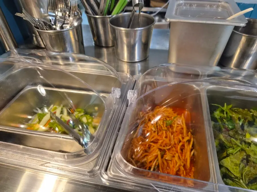 Using the restaurant’s side-dish station