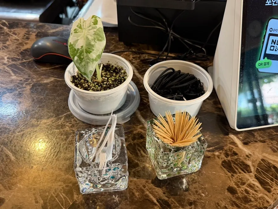 Floss and hair ties placed at the checkout counter