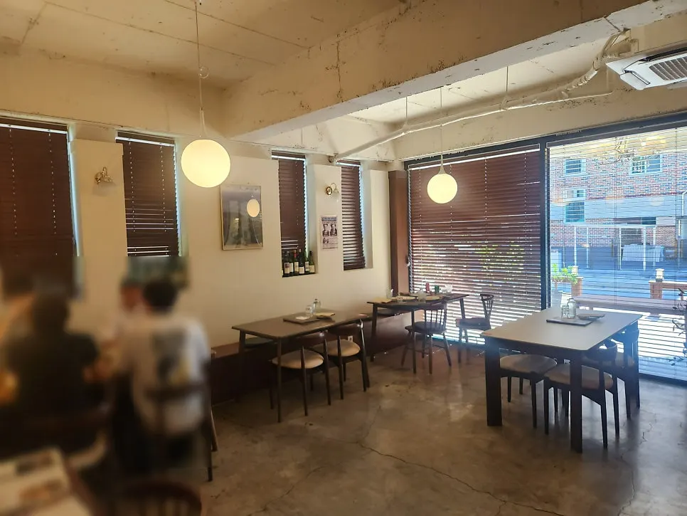 Interior space with group seating at Oseuseu