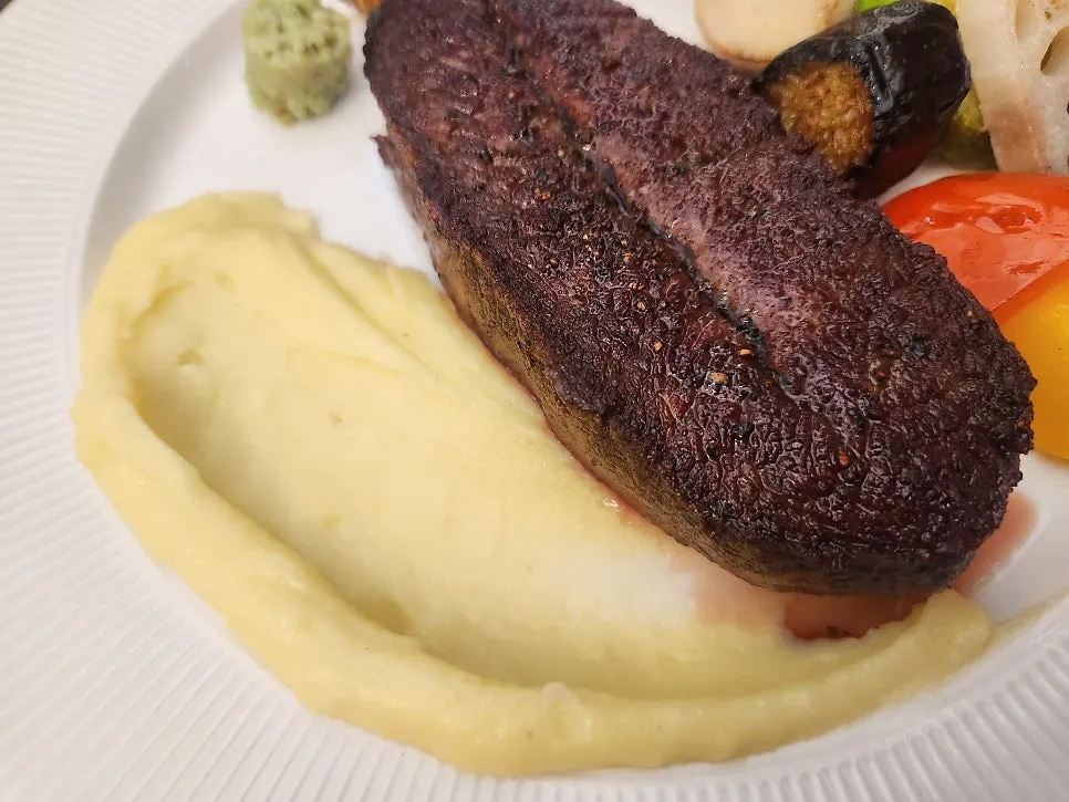 House steak served well-grilled
