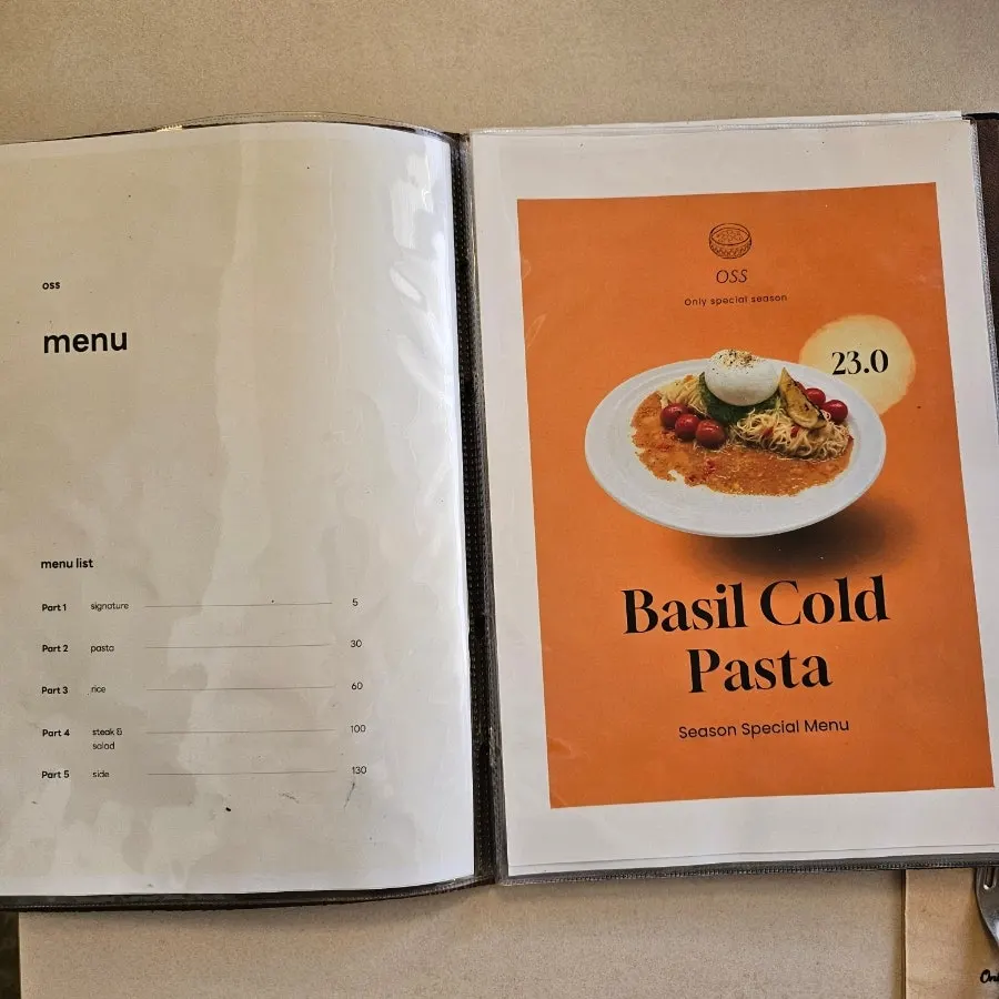 Handwritten menu board at Oseuseu