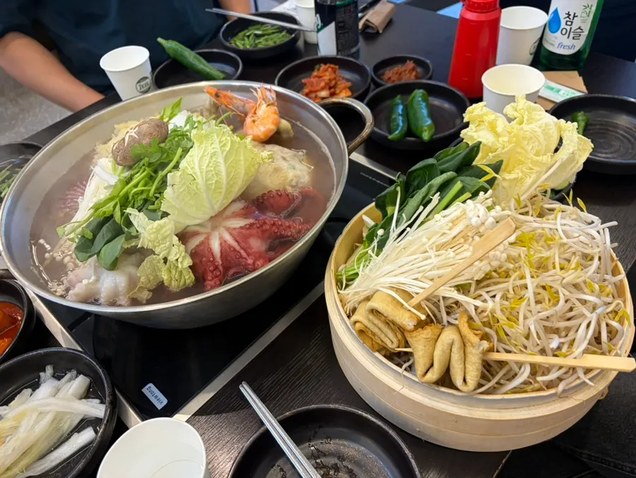One pot of seafood haesintang for four served on the table