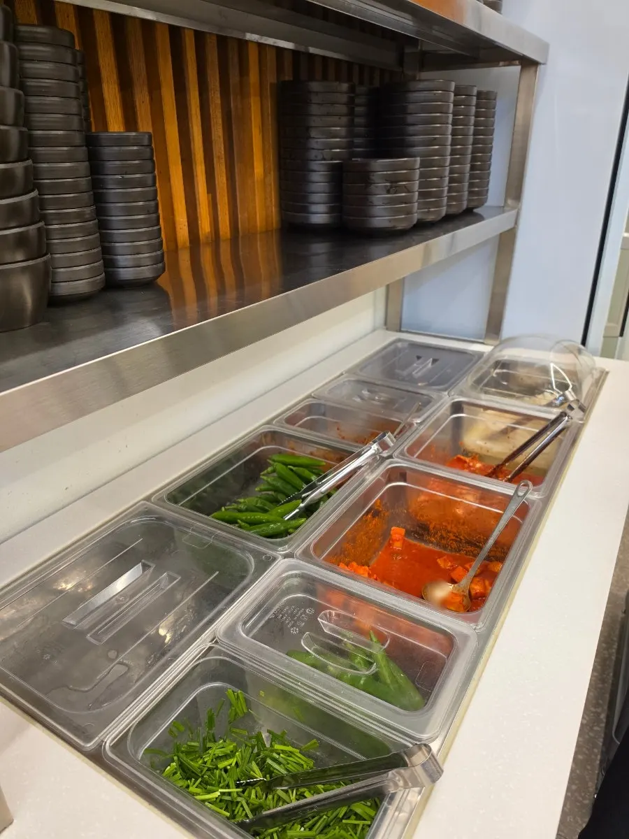 Self-serve bar at Haepumgye for refilling side dishes