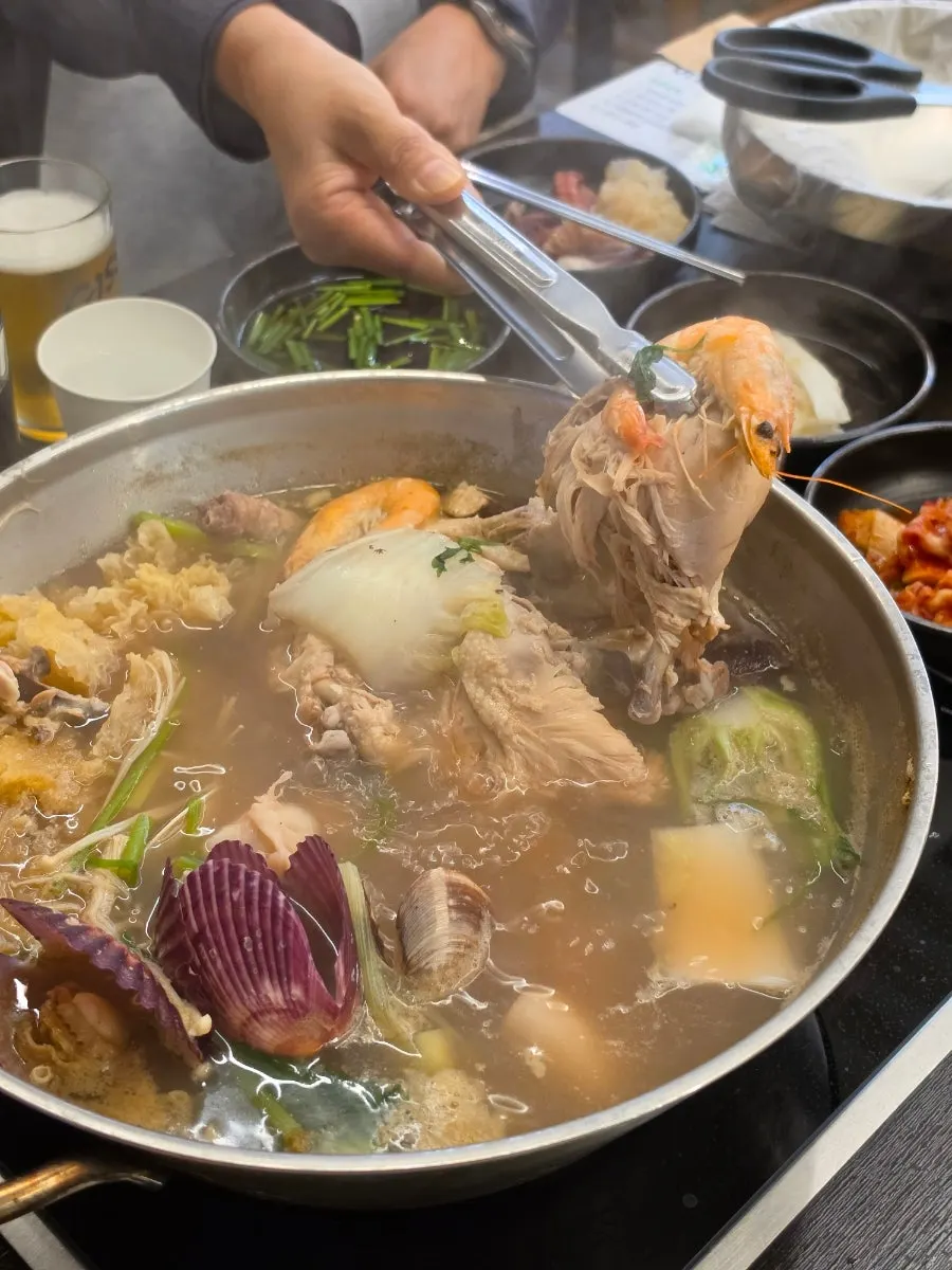 Haesintang broth with chicken and seafood blended together