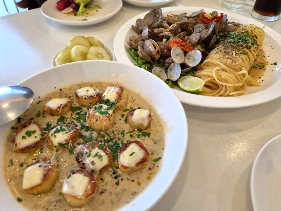 Salmon salad alongside the main dishes