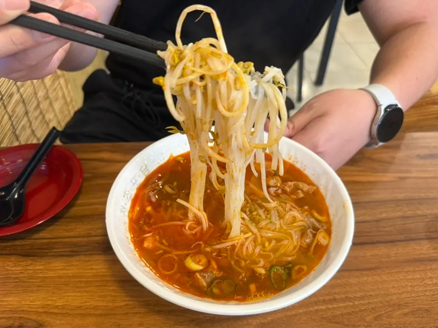 Broth and meat in the spicy beef pho