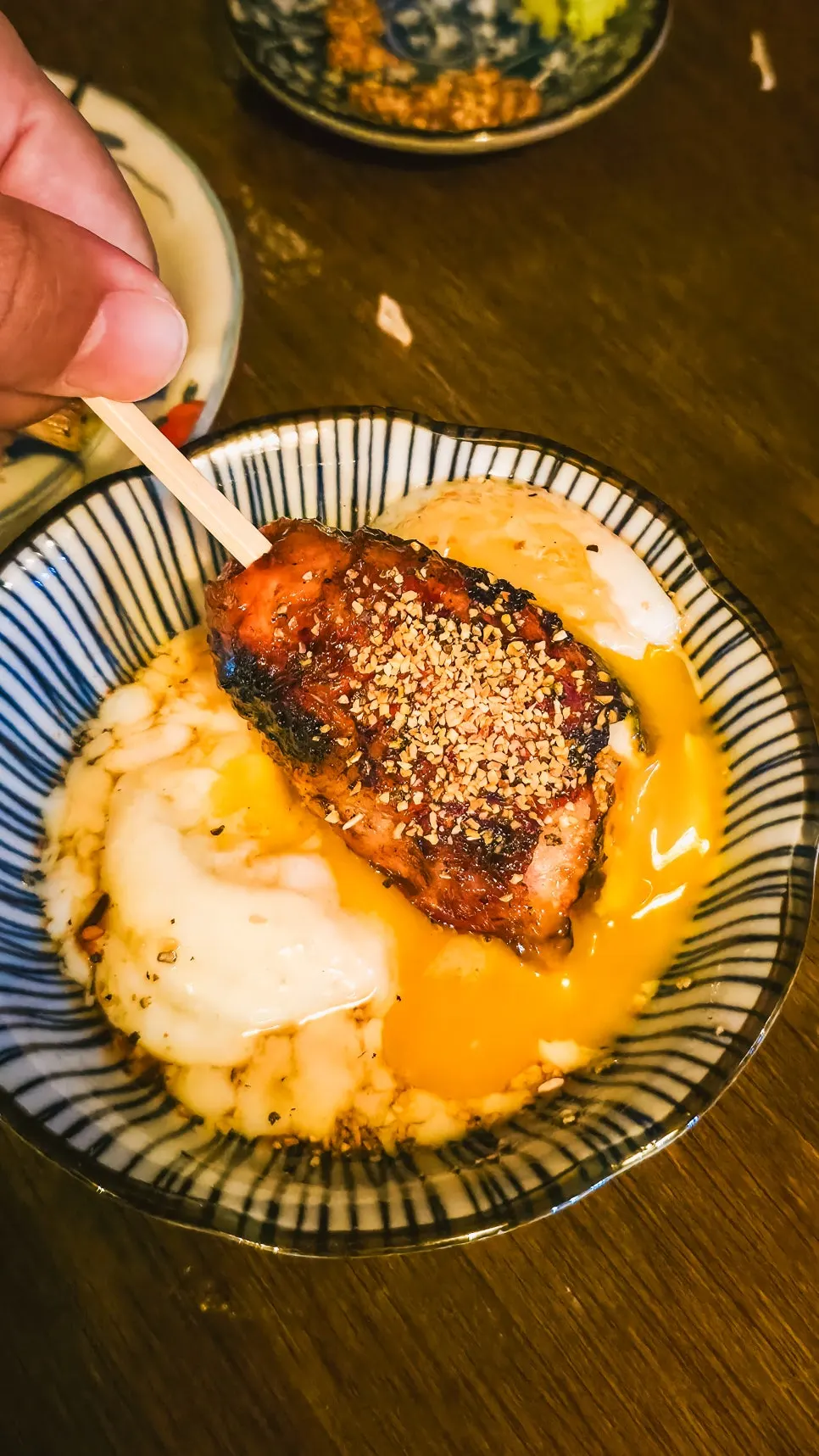 Cheese tsukune served with a 3-minute hourglass