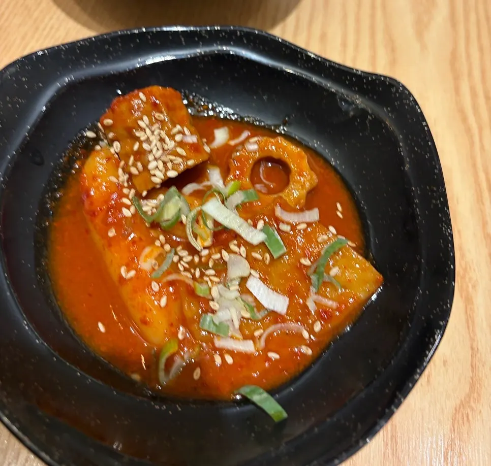 Varied complimentary side dishes at the sushi restaurant