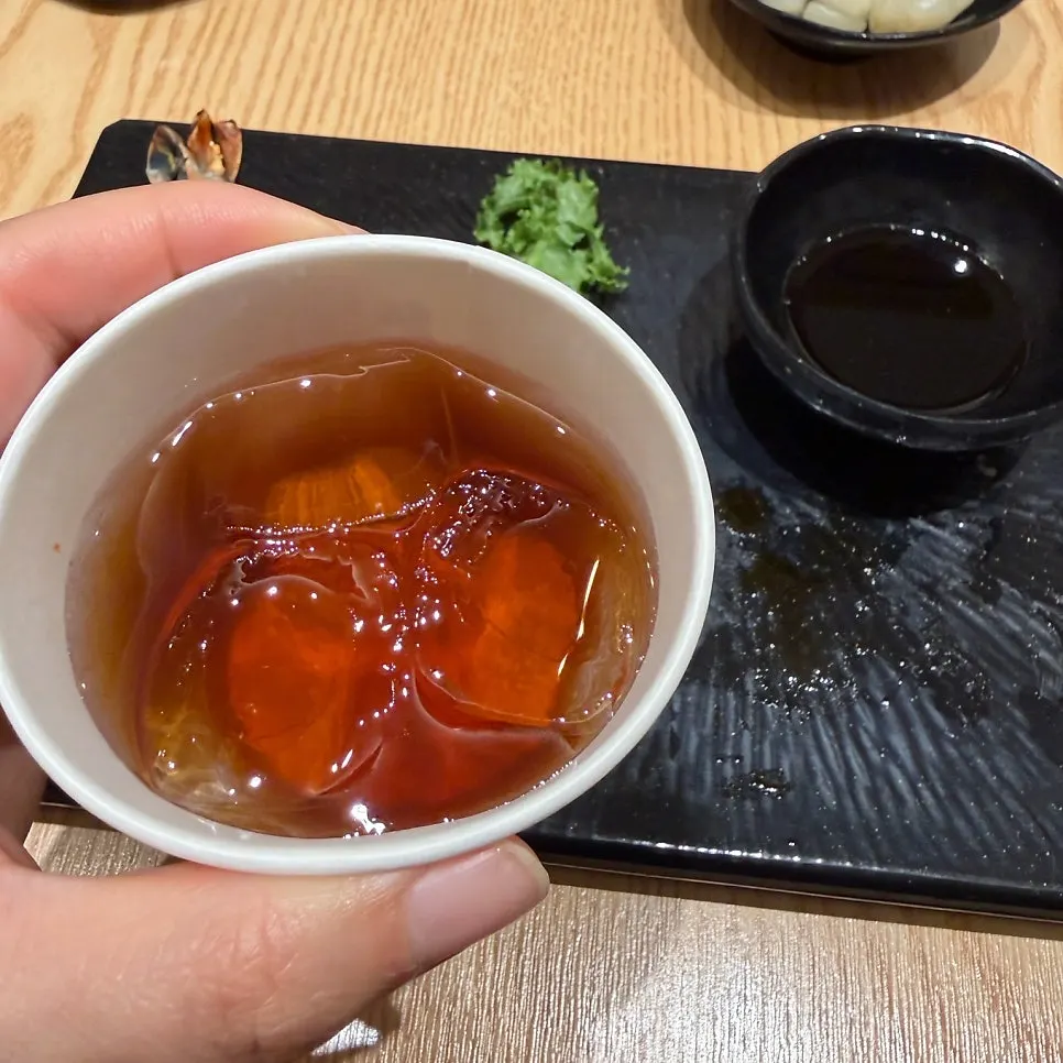 Dessert plum tea served after the sushi meal