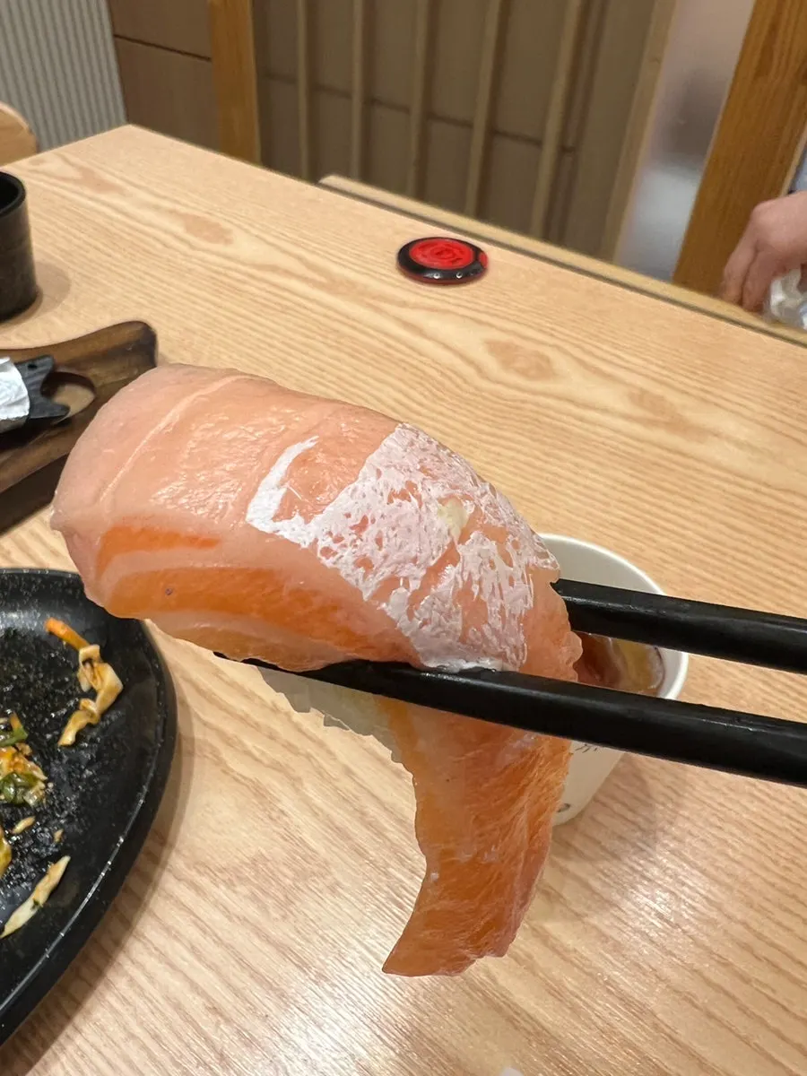 Close-up of salmon belly sushi