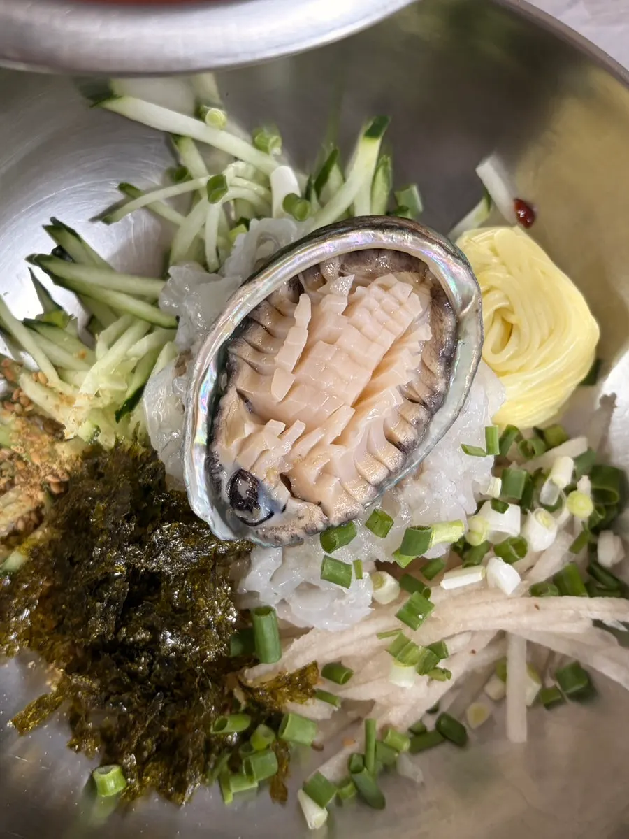 Assorted sashimi wrapped in perilla leaves