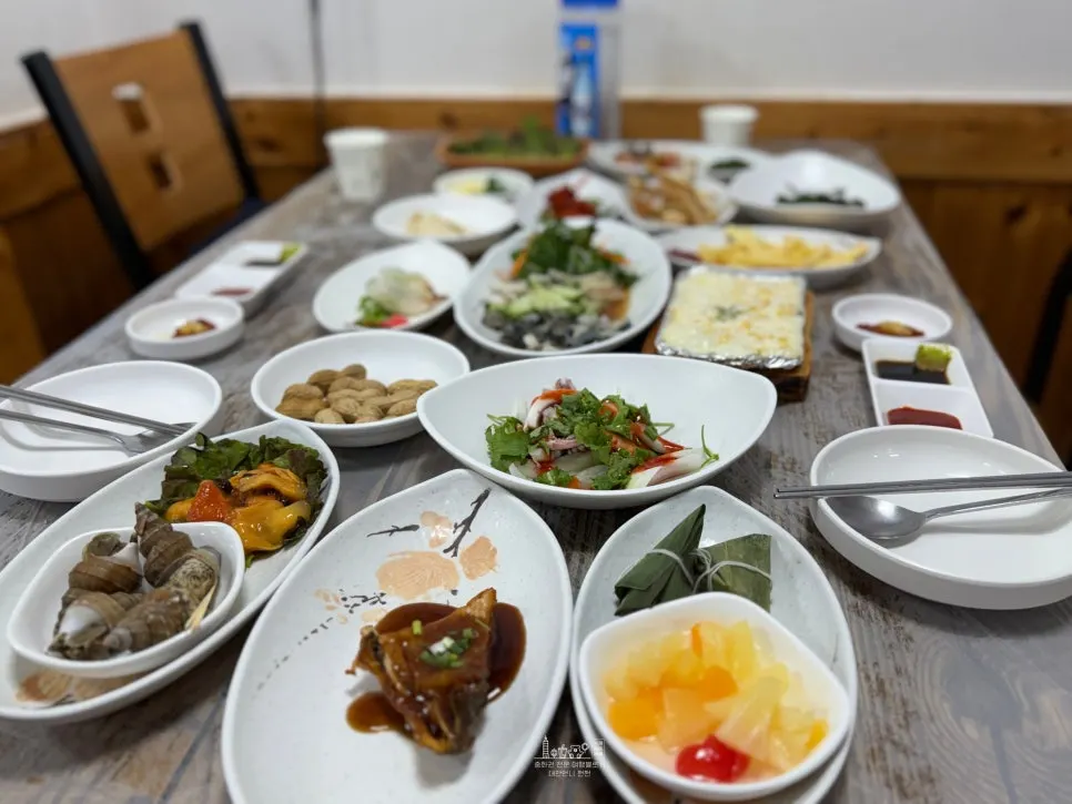 Over twenty dishes spread across the table