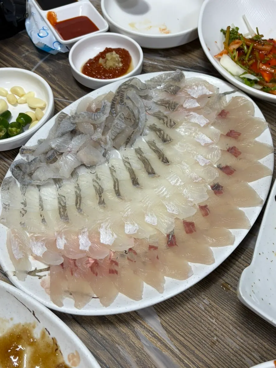 Table full of seafood side dishes