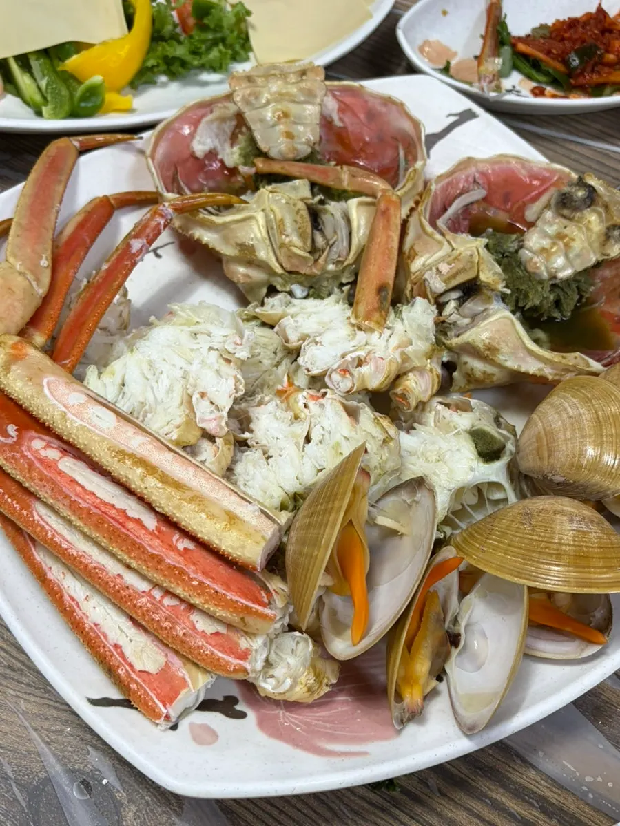 Crab meat picked up with chopsticks