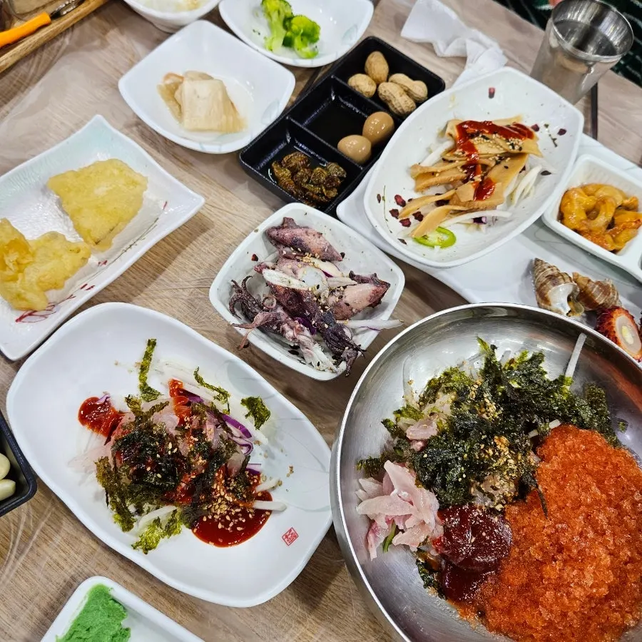 A table full of seafood side dishes