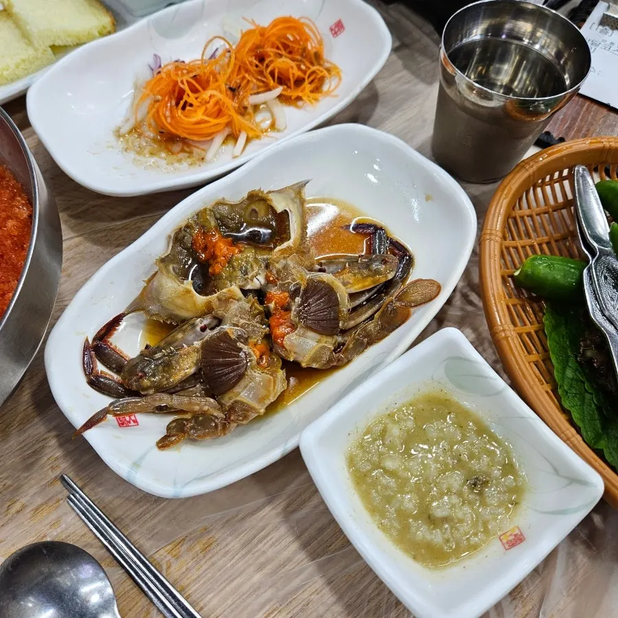 Blanched seafood and side dishes on a plate