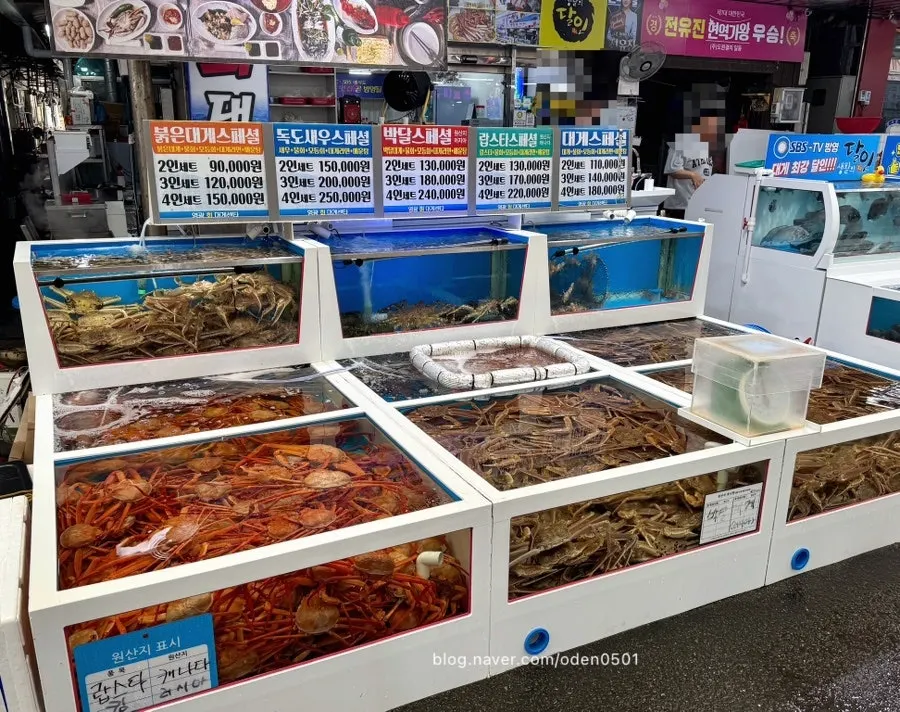 Live fish and snow crab tanks in front of the restaurant