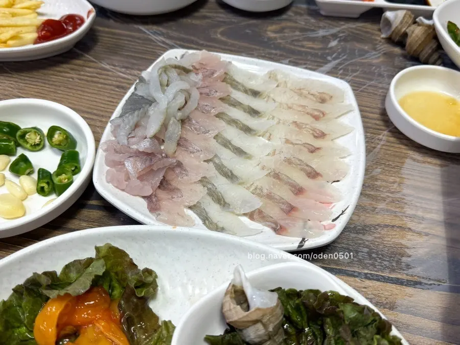 Plate of assorted flounder and rockfish sashimi