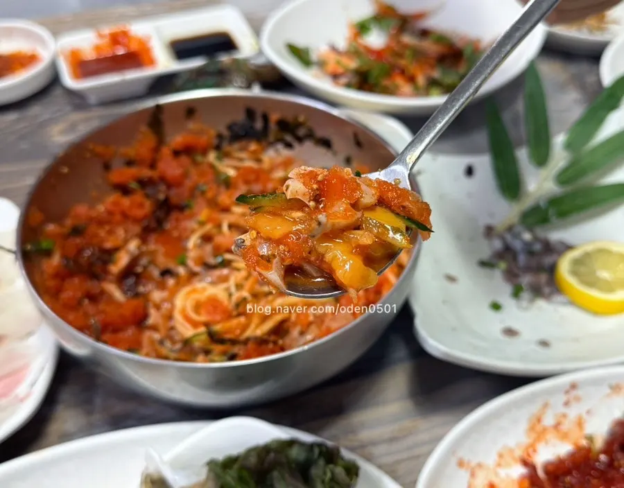 Seafood mixed into the seasoned mul-hoe broth