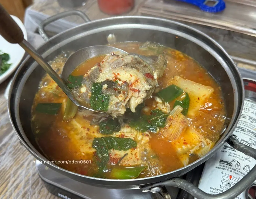 Spicy fish stew simmering in the pot