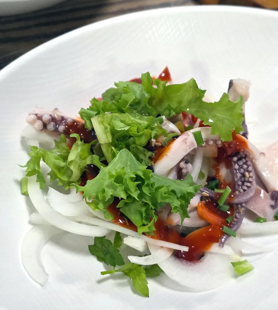 A plate of freshly served live octopus