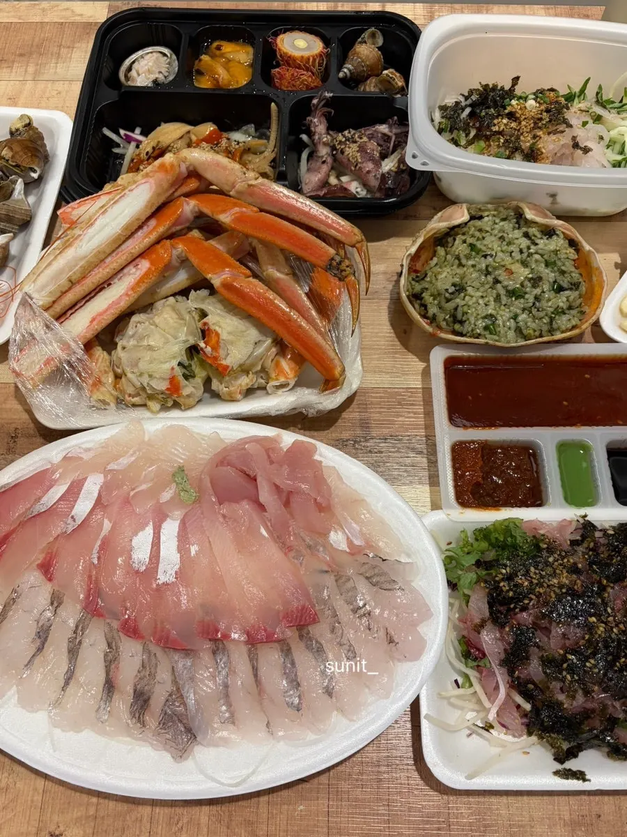 A spread combining crab and sashimi