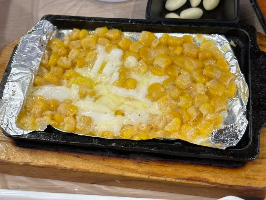 Abalone porridge served as an appetizer