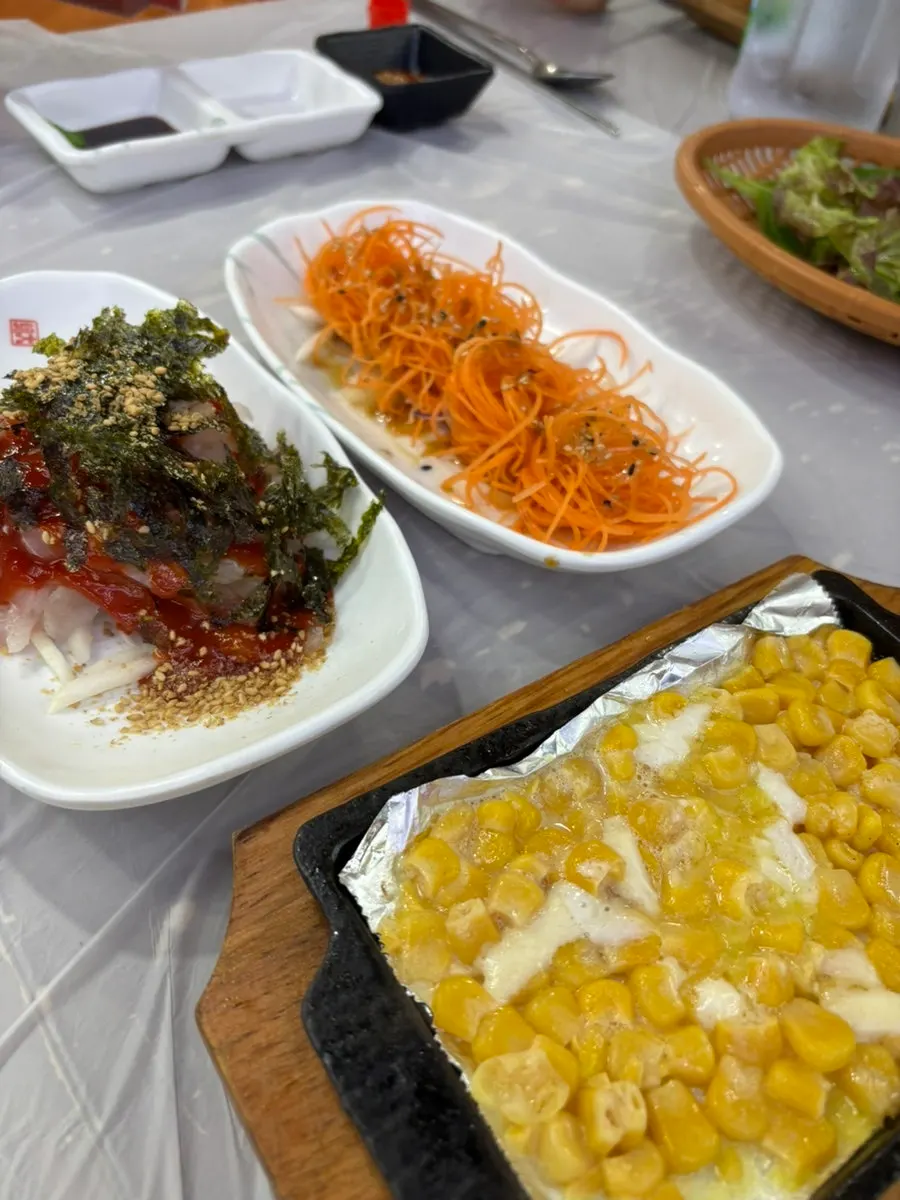 Abalone porridge served with the sashimi set