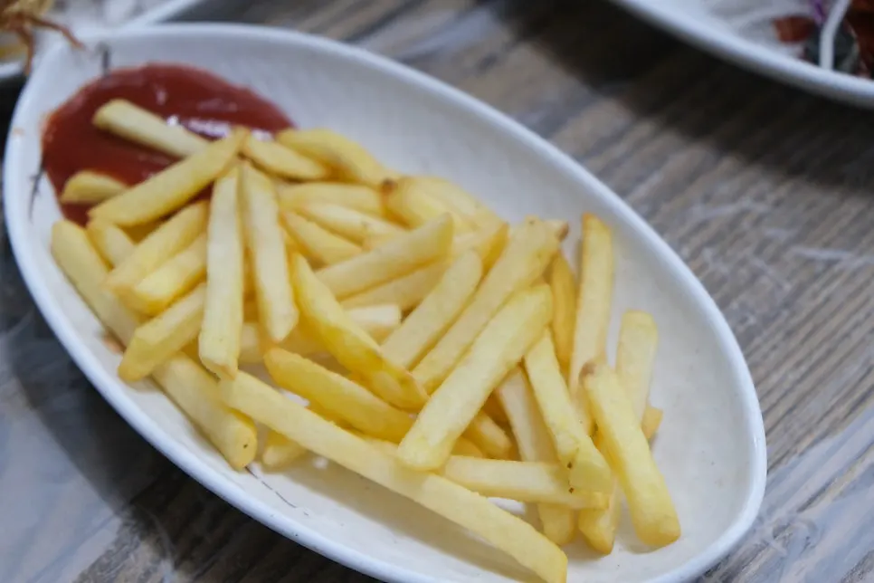 Corn salad topped with cheese and mayo