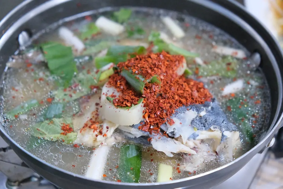 Spicy fish stew simmering