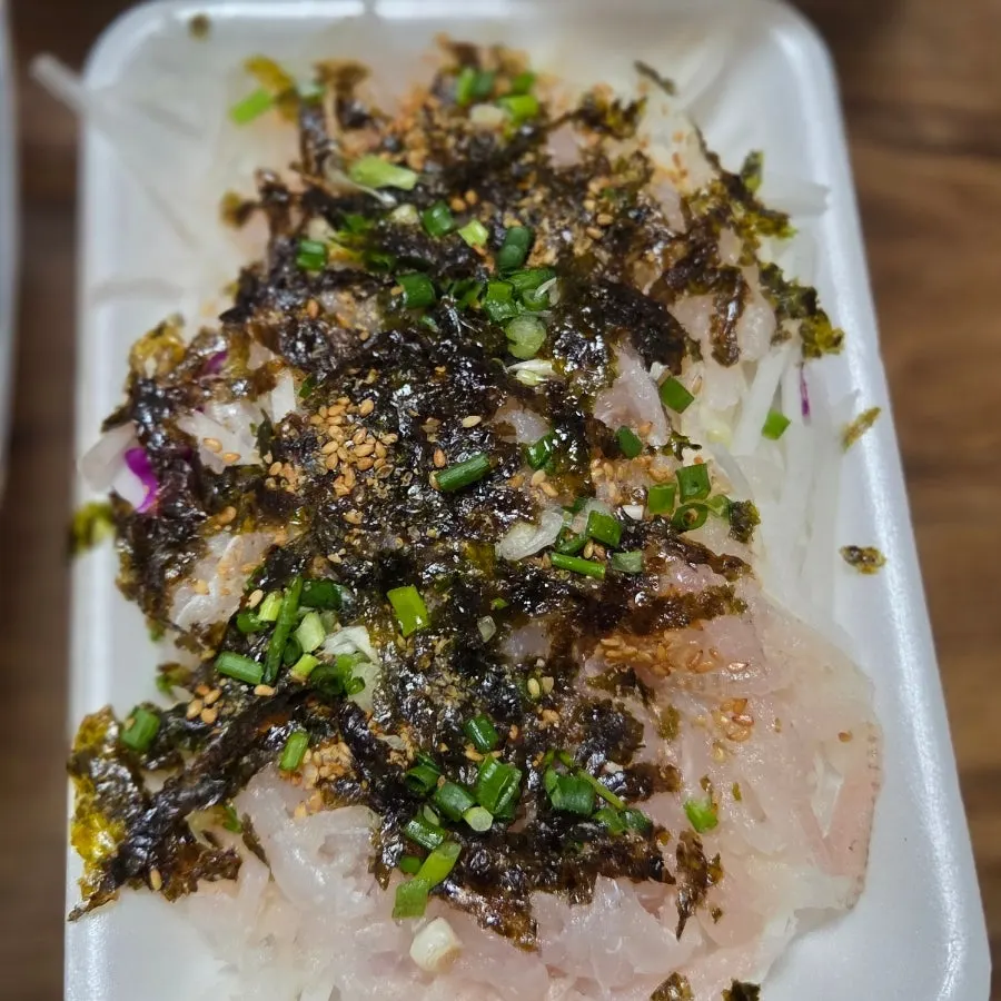 Close-up of thickly sliced sashimi