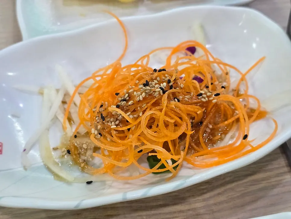 Seasoned raw fish and soy-marinated crab banchan