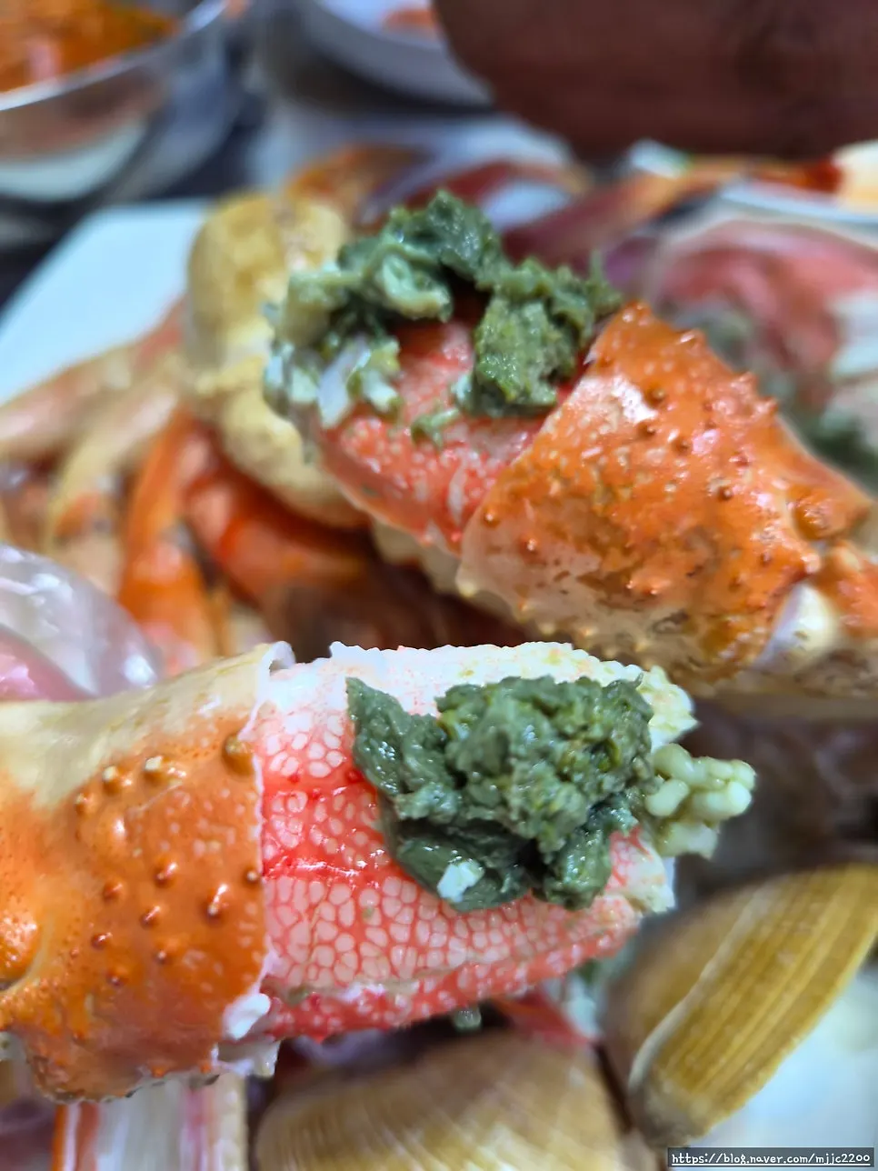 Picking crab leg meat by hand