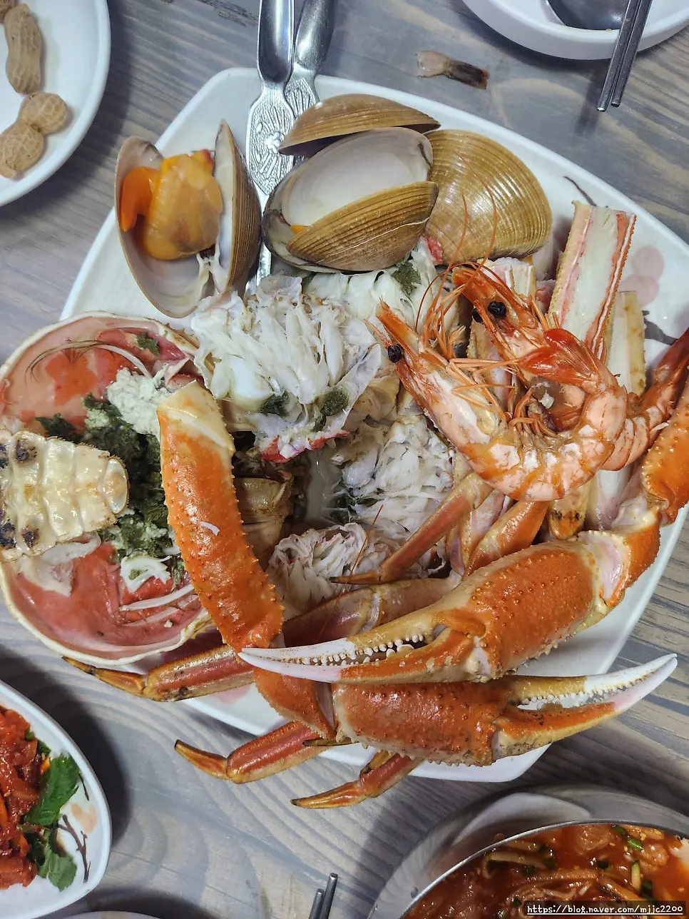 A table with crab and sashimi together