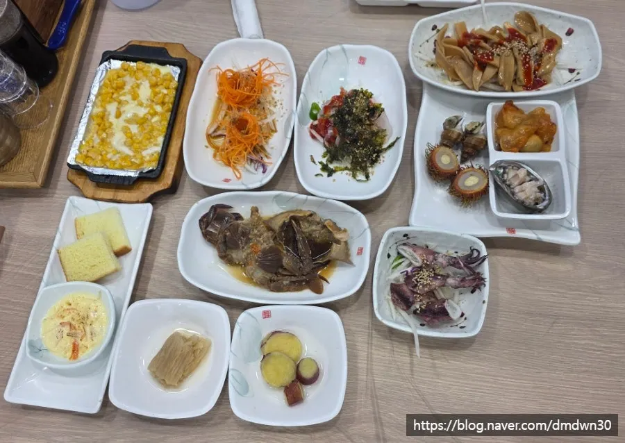 Abalone porridge and side dishes laid out on the table