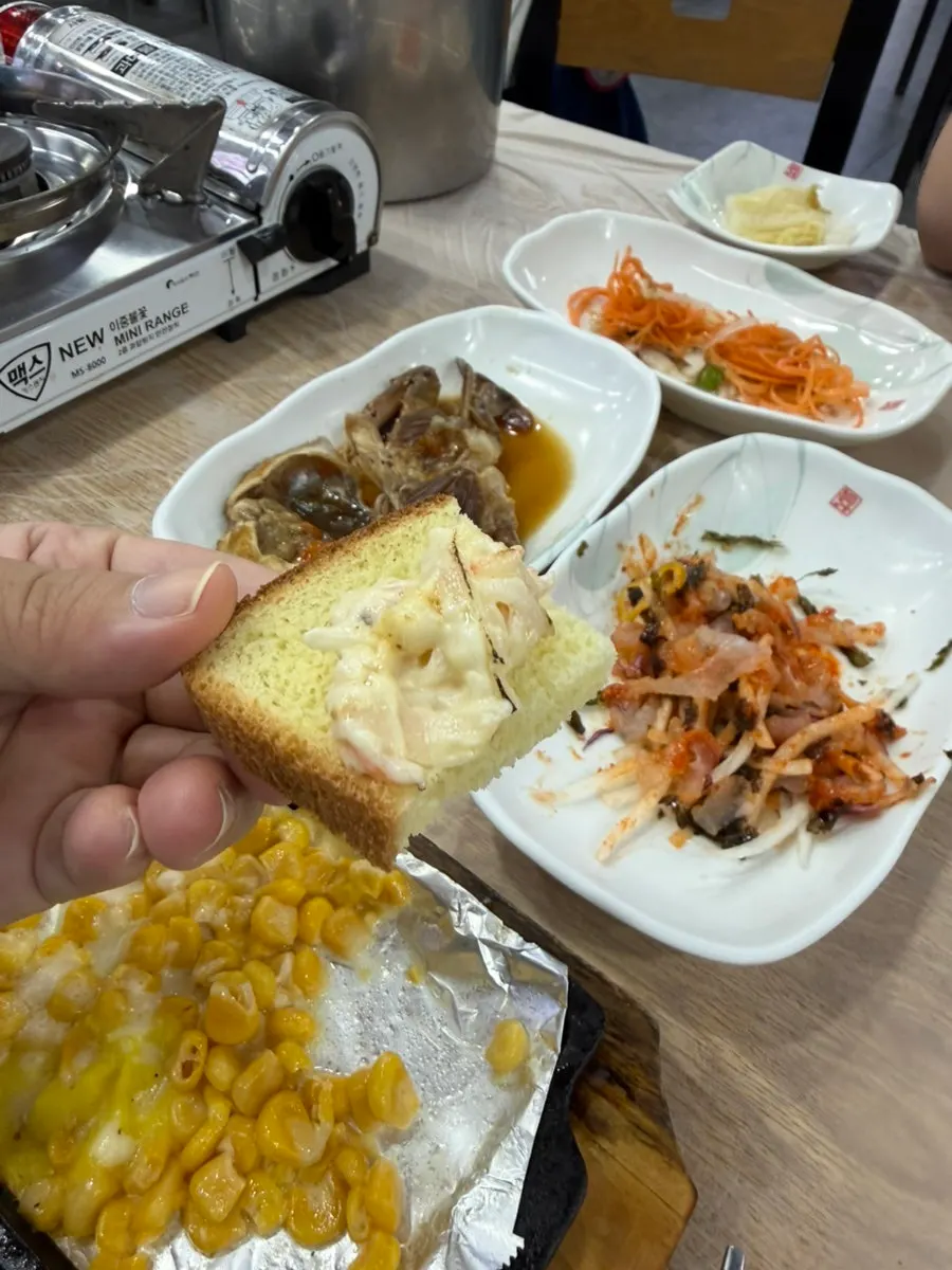 Crab jang, conch, abalone and sea squirt banchan