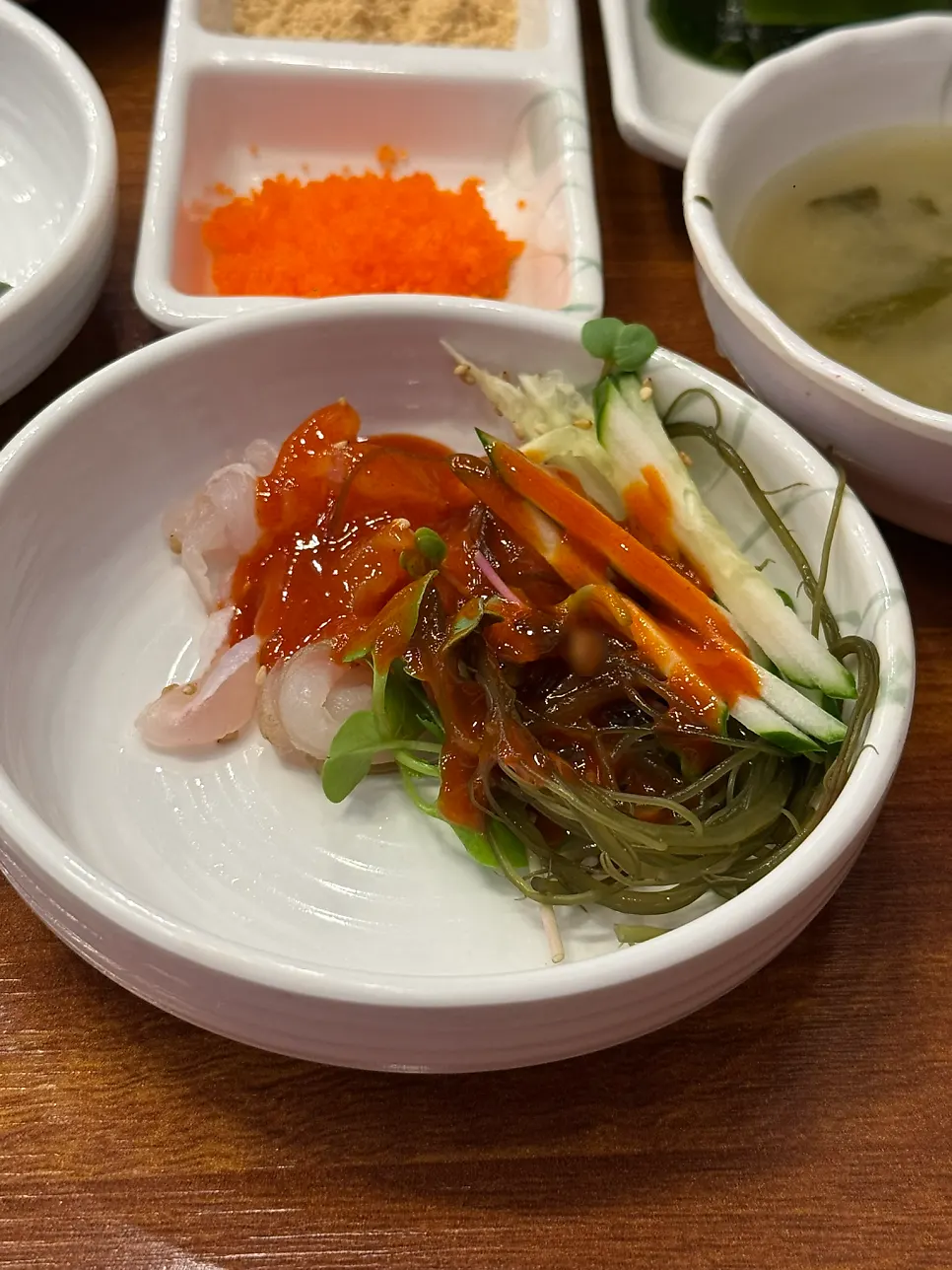 Flounder and vegetables scooped onto a small plate