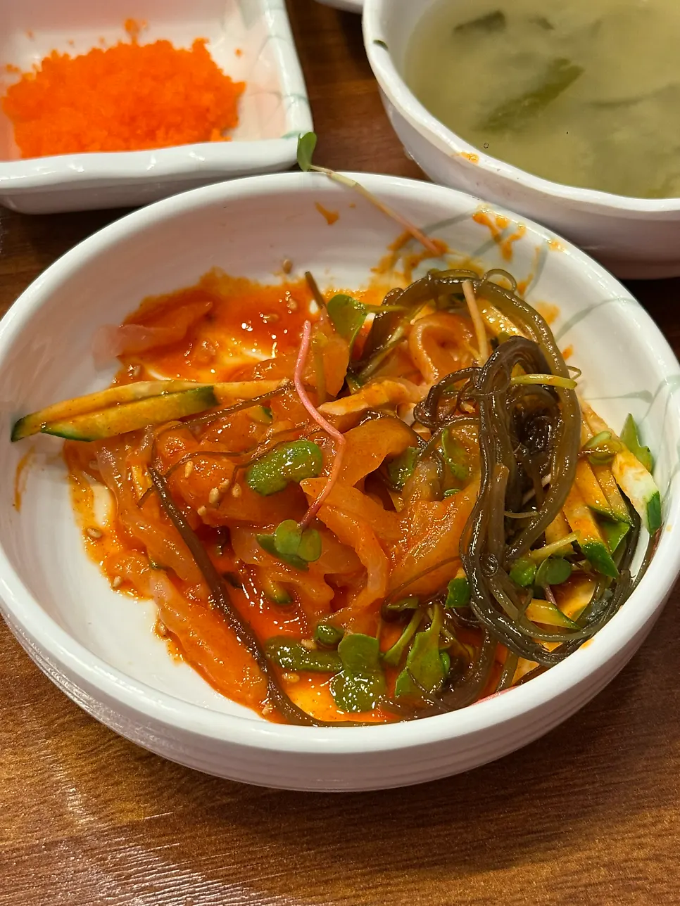 Flounder makhoe being tossed with chojang