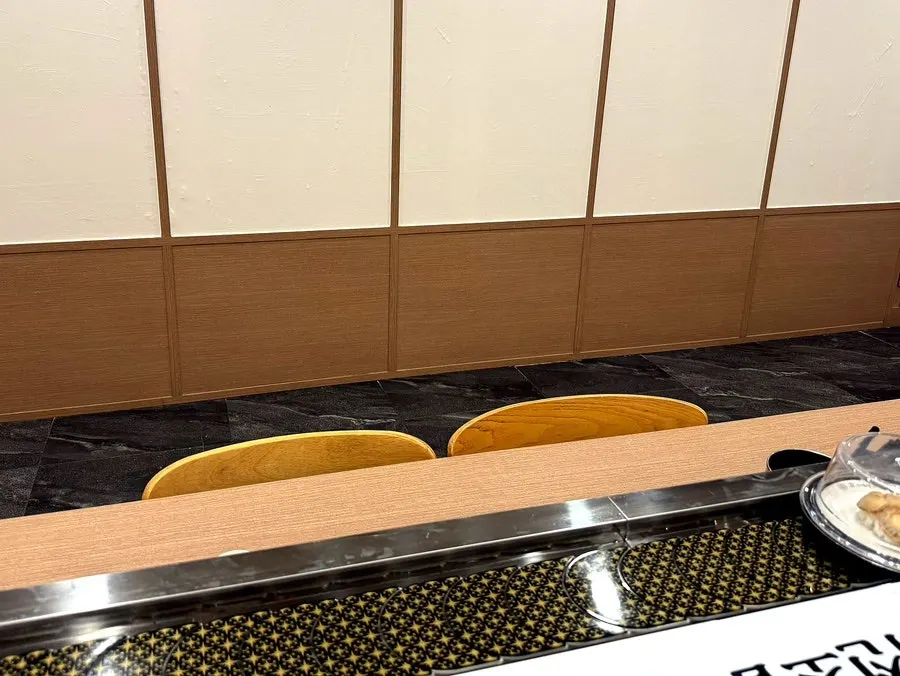 Interior view with the conveyor sushi rail running through