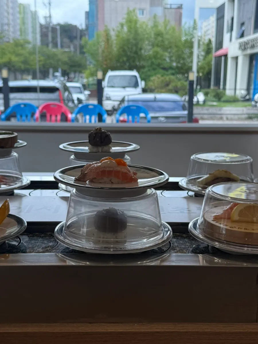 Flat-price sushi on the conveyor rail