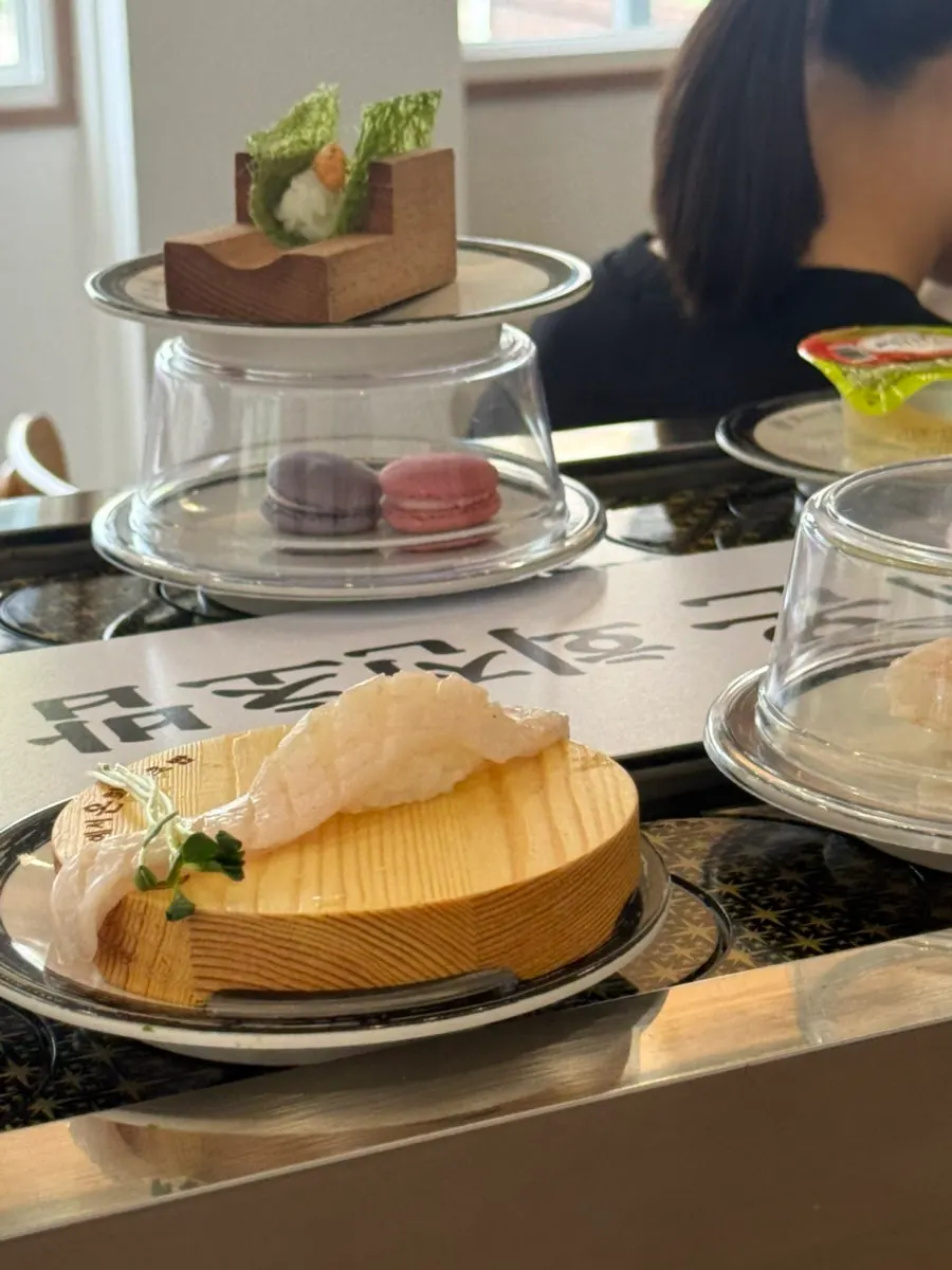 Rakkyo and pickled ginger on the conveyor rail