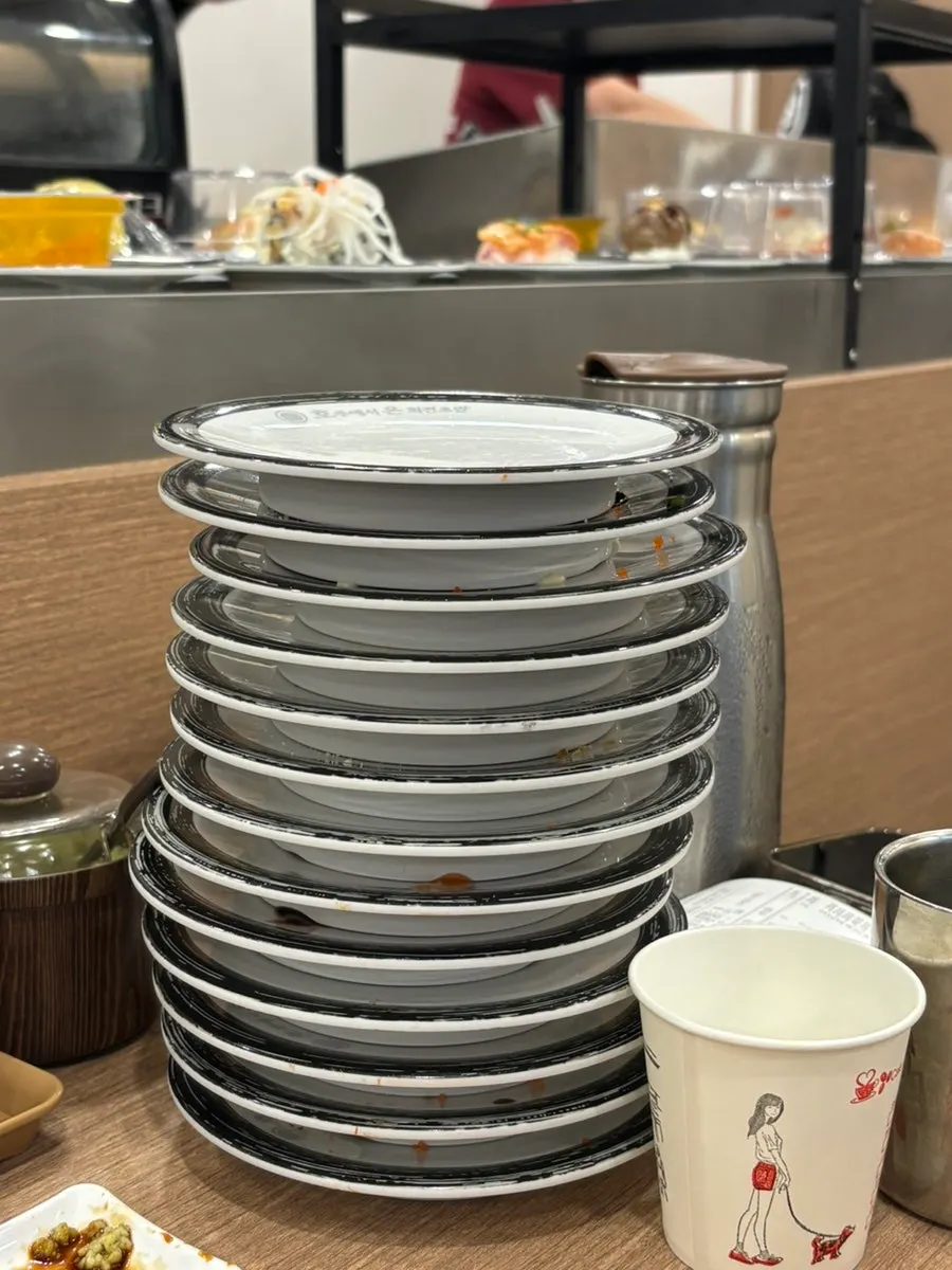 Stack of empty plates after the couple's meal