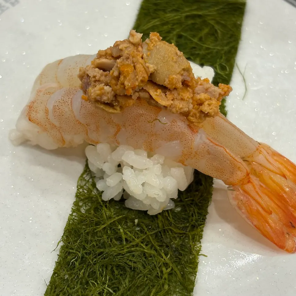 Conveyor-belt sushi plates on the rail