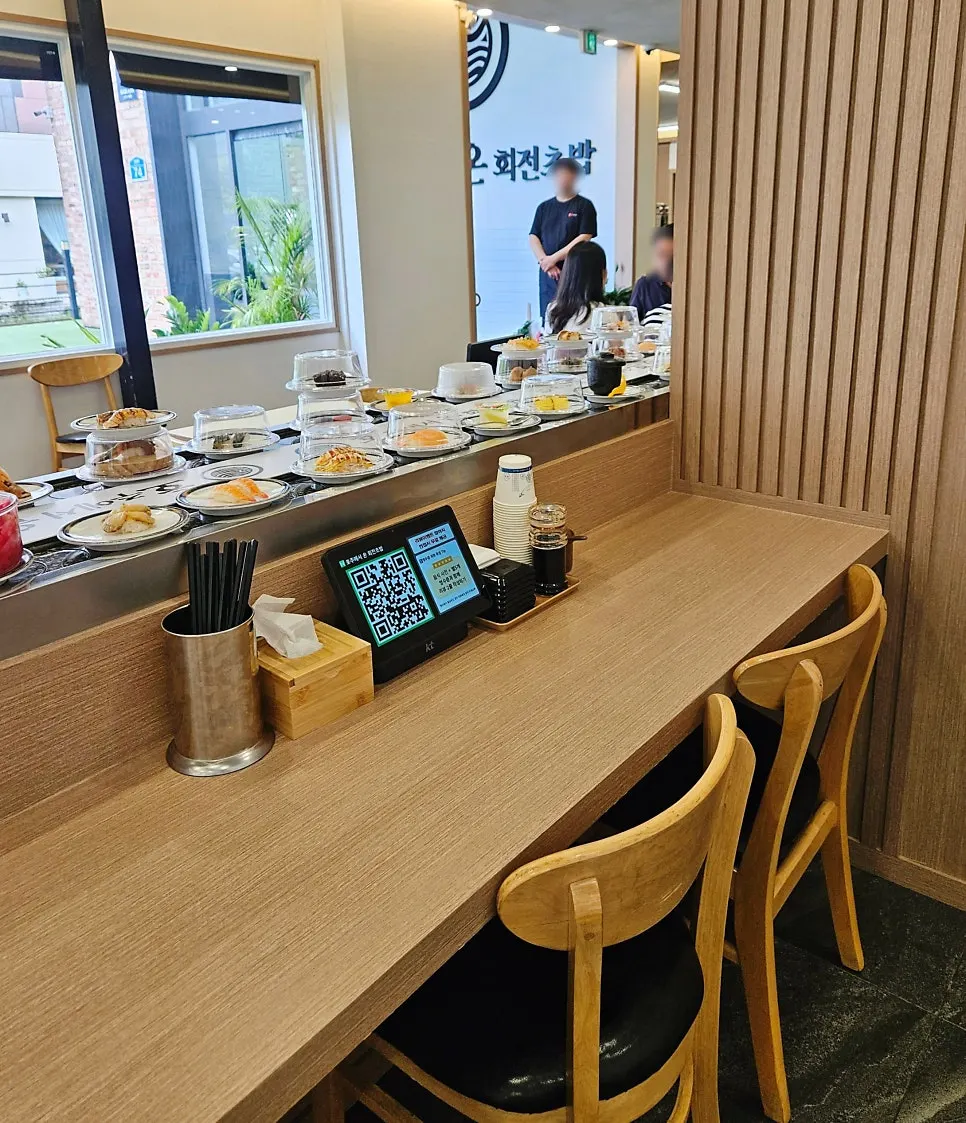 Passageway leading to inner seating inside the conveyor sushi restaurant