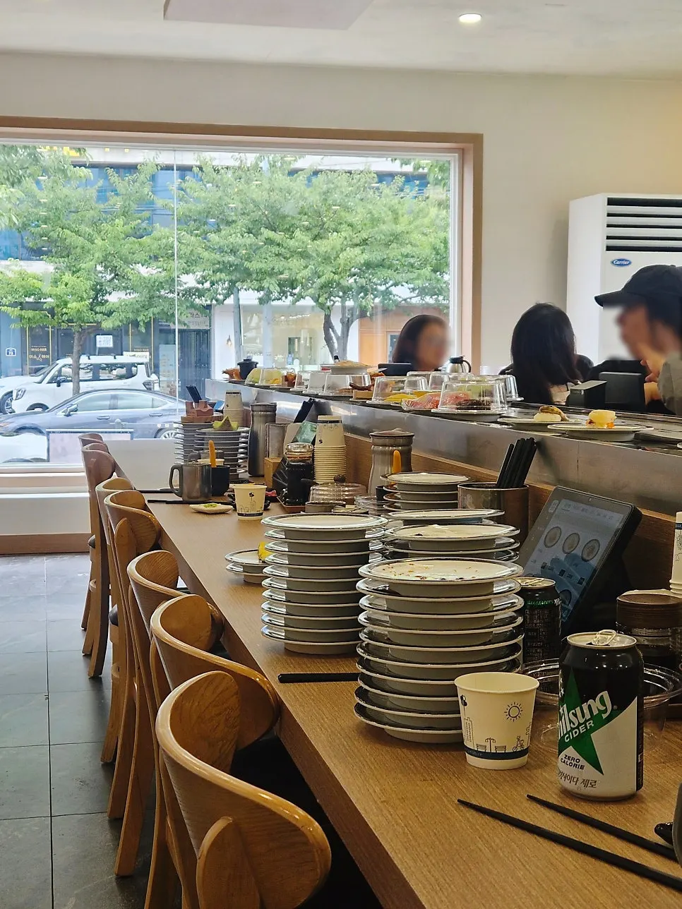 Stack of sushi plates piled up after finishing the meal