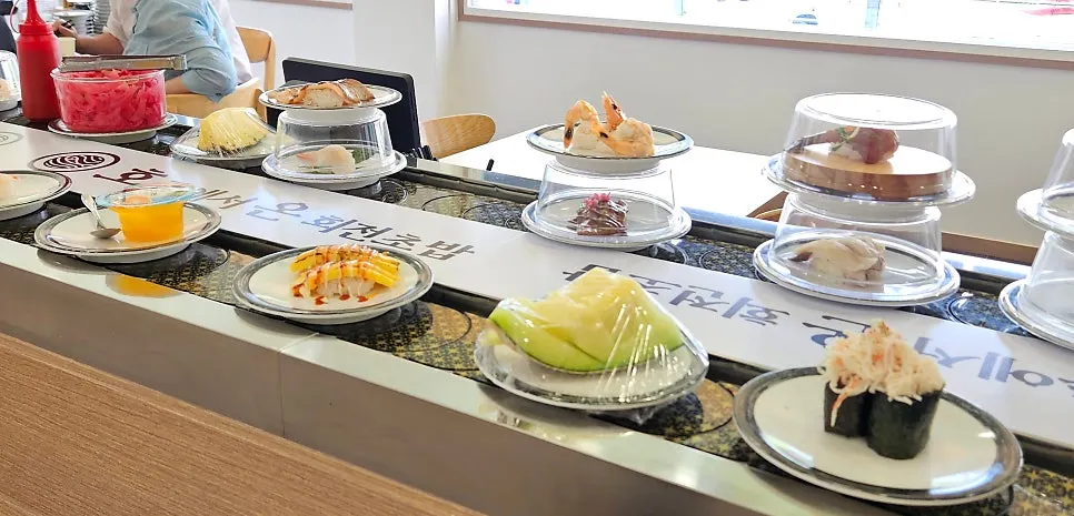 Side dishes including steamed egg, pudding, and fruit