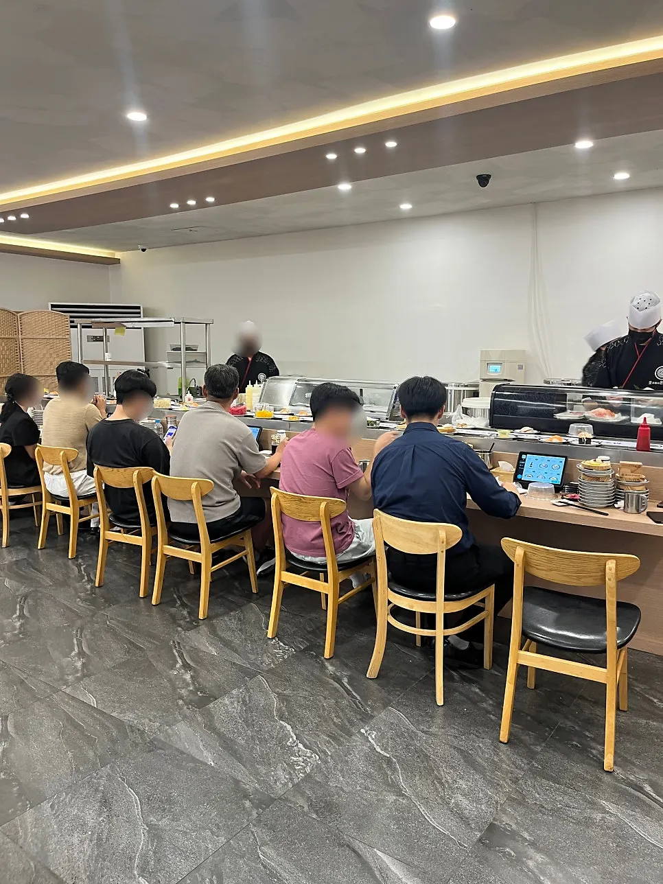 Spacious interior of the conveyor belt sushi restaurant